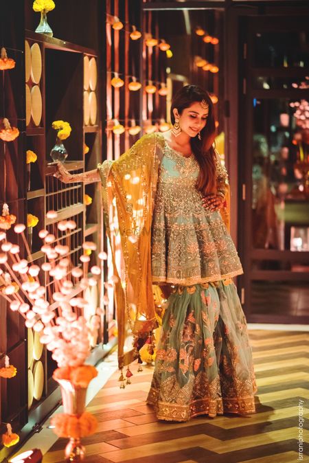 A gorgeous sharara in offbeat hues the bride wore for her dhol night 