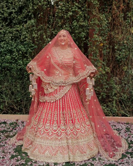 Photo of bridal portrait in pink lehenga