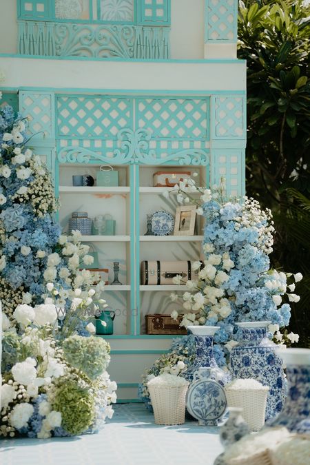 Photo of Lovely white and powder blue decor with paisley elements for a day event