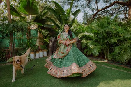 Bride on her wedding day in a bright green lehenga