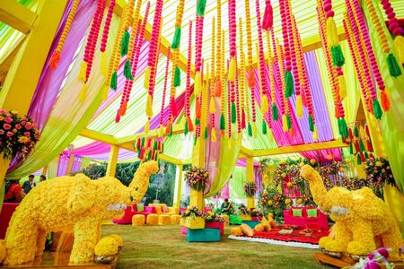 Floral decor in a melange of colors at a mehendi ceremony