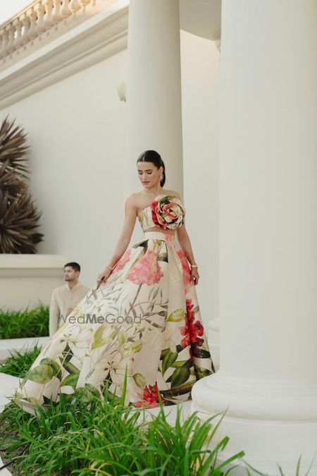 Photo of Gorgeous floral printed crop top with rose detailing and skirt set for an outdoor mehendi brunch