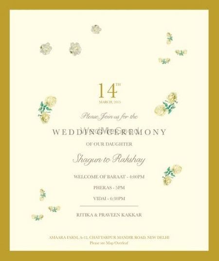 Photo of unique vintage invitation cards in pastel pink and gold border