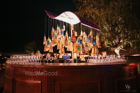 Photo of Super unique bar decor idea with Moroccan style hanging lamps for an outdoor sangeet