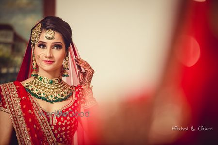 Bride looking into mirror shot