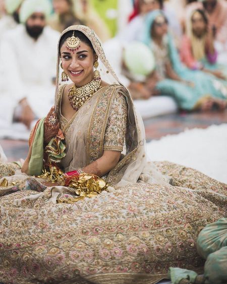 Ivory & Gold Is The Trending Wedding Color Combination | ShaadiWish | Sabyasachi  lehenga bridal, Bridal outfits, Bridal lehenga