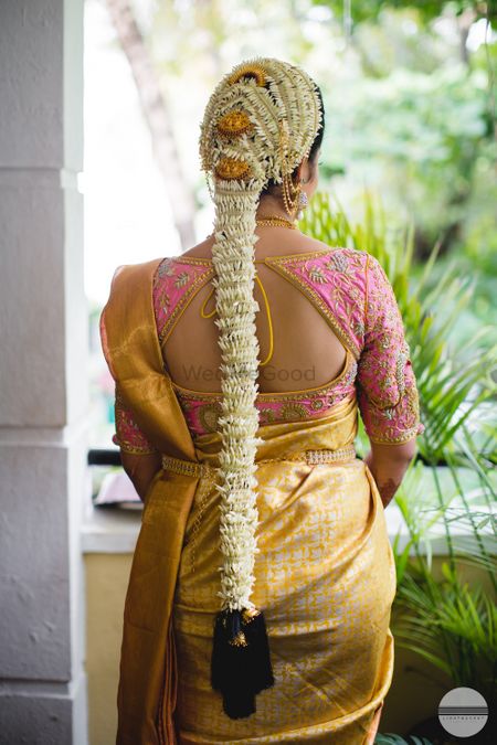 South Indian traditional bridal hairstyle with mogra flowers 
