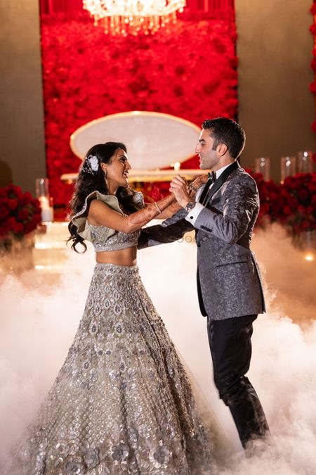romantic first dance shot by couple on sangeet or reception