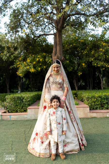 Bride with kid nephew matching her outfit