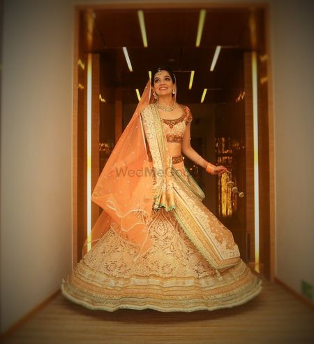 Photo of Peach and Off White Lehenga with Lace and Embroidery