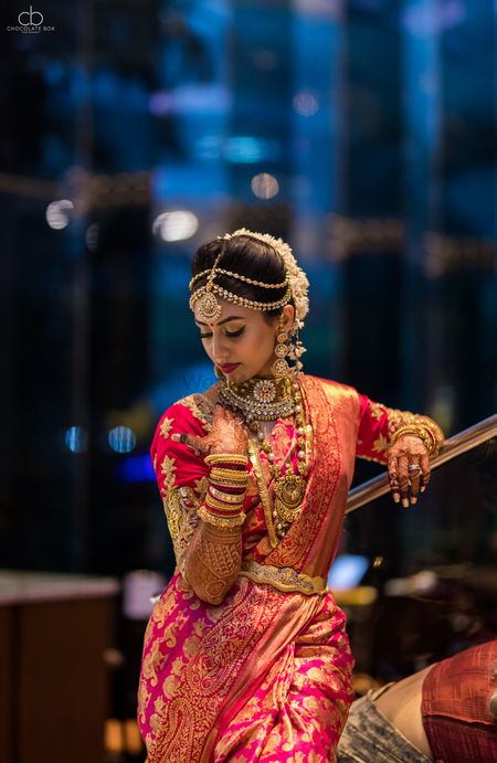 Photo of South Indian bridal look in red and gold kanjivaram