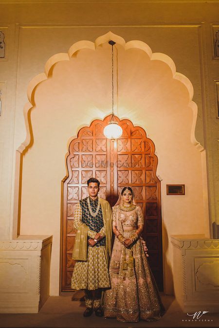 Photo of Couple shot with unique sherwani