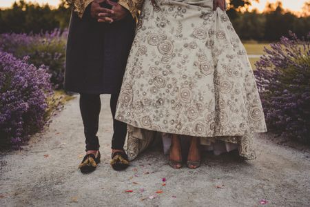 Bride and groom portrait showing shoes