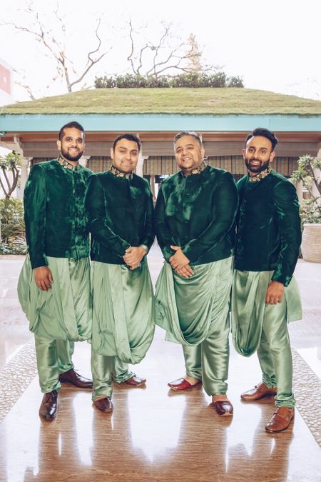 Photo of Groomsmen in draped kurta and green jackets