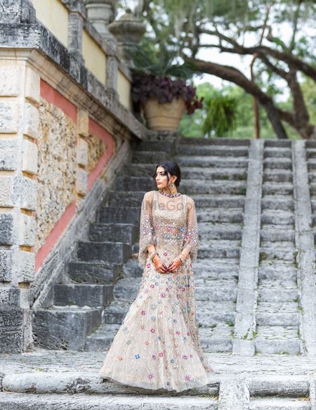 Engagement lehenga with cape and florals 