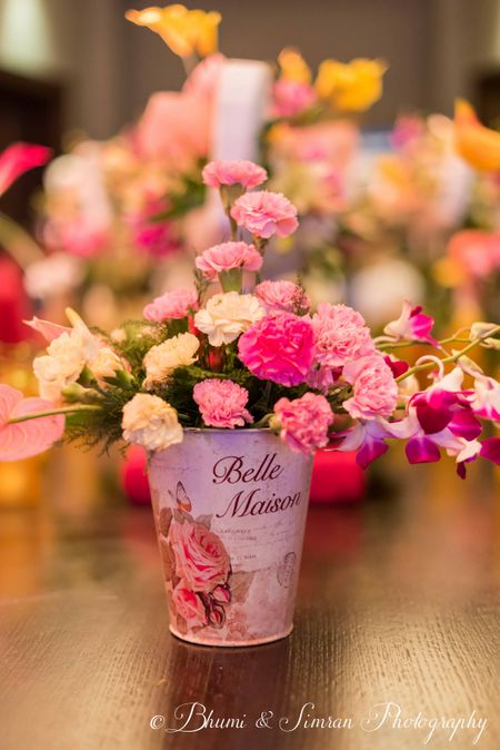 Floral roses in vintage bucket