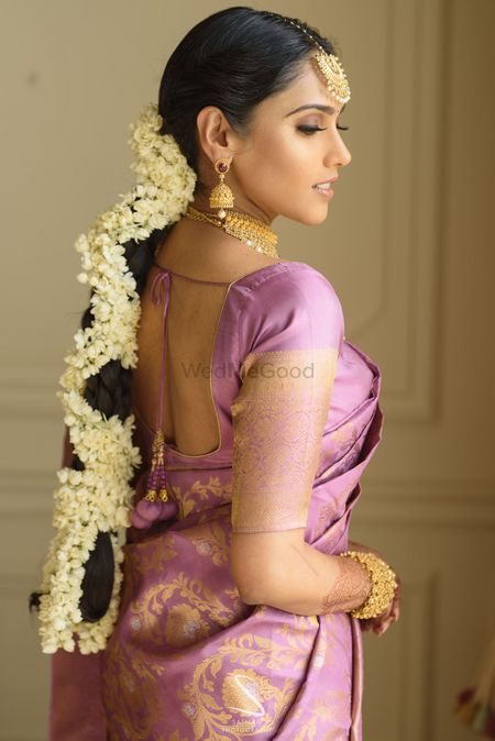 Photo of south indian floral bridal braid with mogra