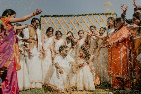 Photo of Fun haldi photos with floral shower