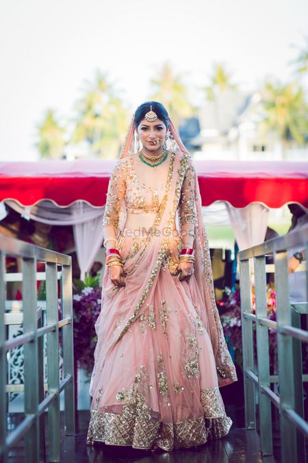 A gorgeous bridal entry of a bride in pink 