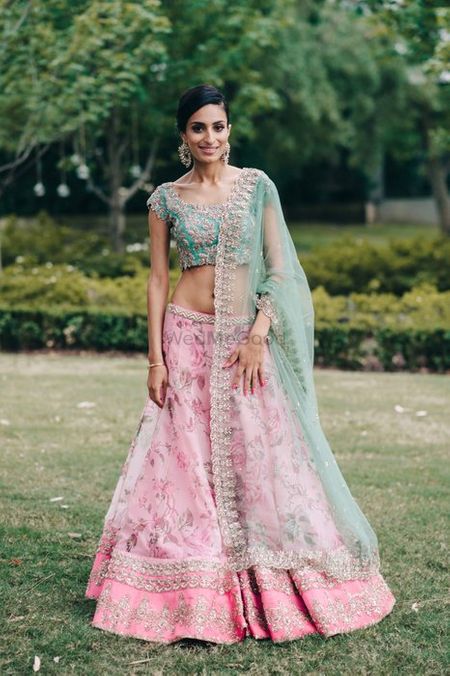 Photo of floral print light pink lehenga with mint blouse by Anushree Reddy