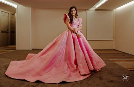 floor length light pink gown with train