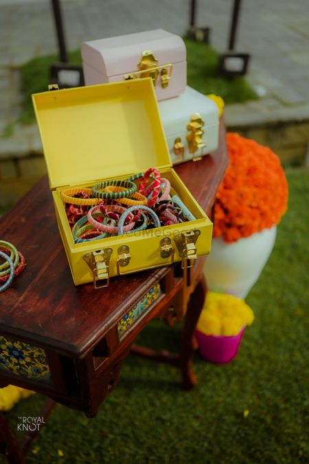 mehendi favour display idea with bangles in trunks