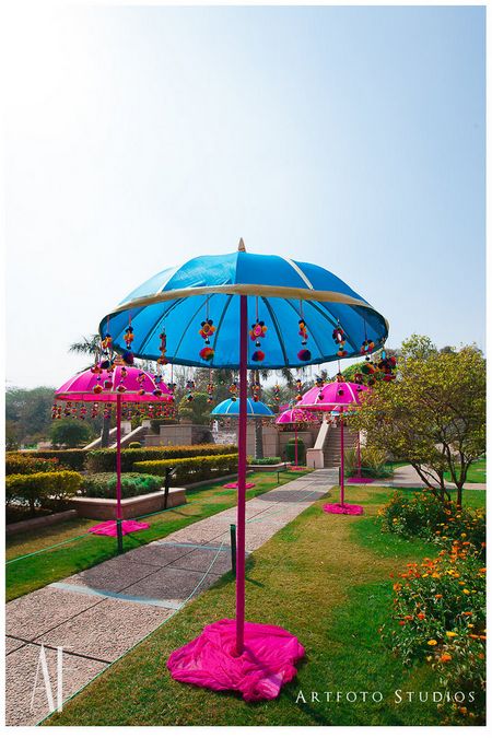 Photo of Turquoise umbrella with hangings