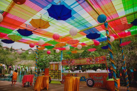 Mehendi decor colourful with parasols 