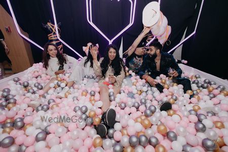 Photo of Fun and unique pit ball pool with colourful balls for the cocktail party