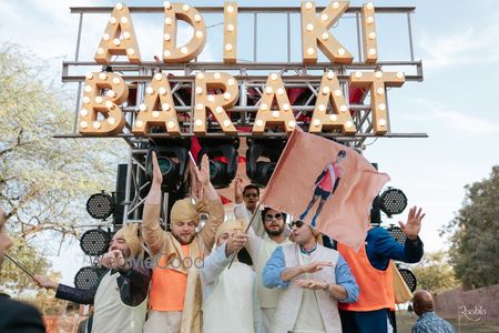 Photo of Baraatis entering on a truck with DJ and speakers for the groom's baraat