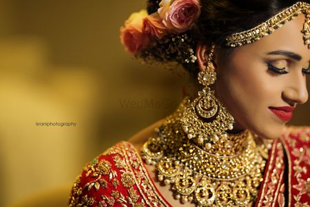 Stunning bridal portrait with gold jewellery for wedding 