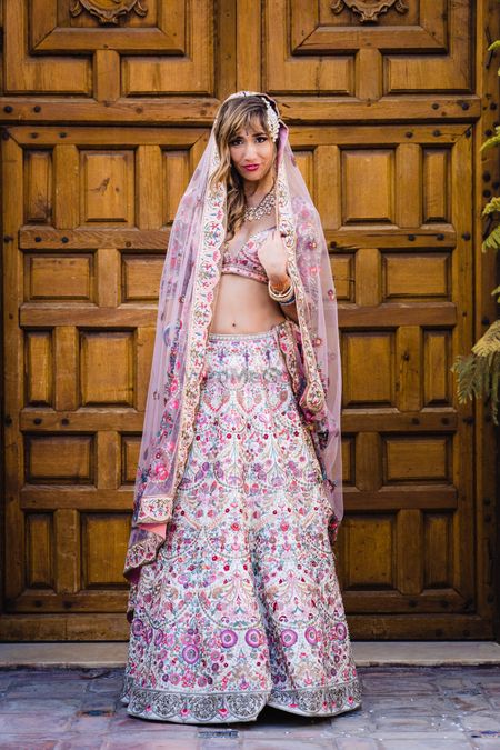 Floral embroidery lehenga with bride in open hair 