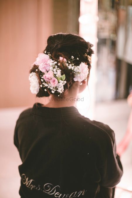Bridal bun with flowers and babys breath