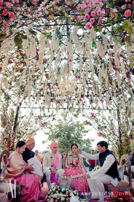 Photo of Fairytale mandap decor with hanging floral strings