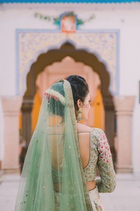 Bride back shot in offbeat bridal colour
