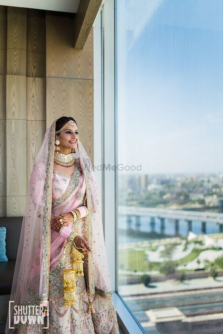 Photo of Bridal portrait by the window