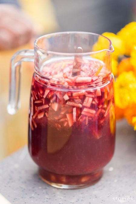 Photo of Red wine sangria pitchers at mehendi
