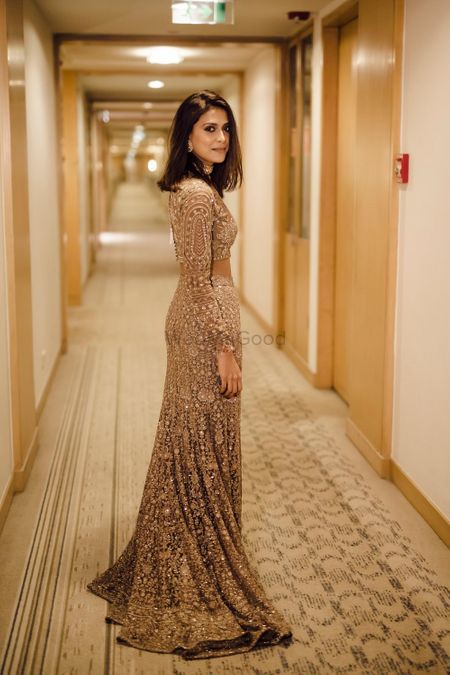Gold cocktail gown with sequin work