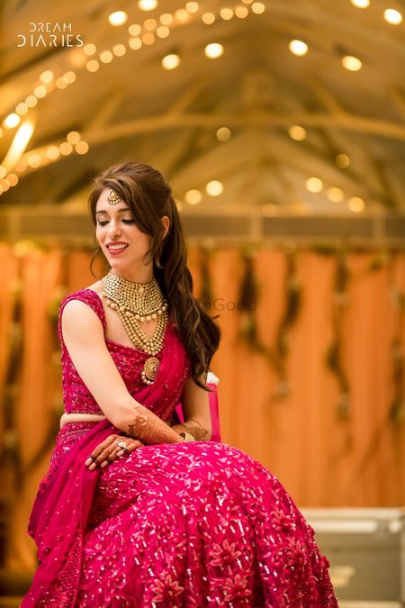 Bridal portrait in red sangeet outfit