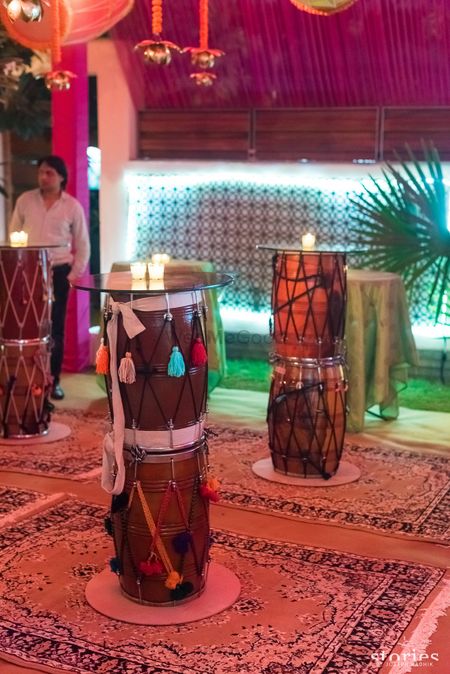 Photo of Mehendi decor idea with dhols as tables