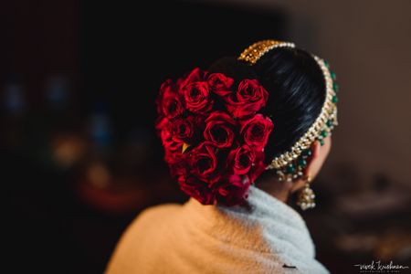 Photo of Red bridal bun with a lot of roses