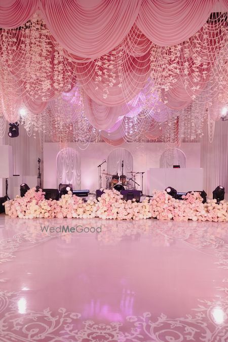 Photo of Stunning sangeet decor set up with pearls and white and pink florals