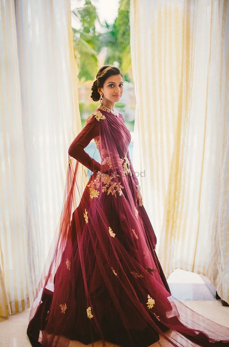 Marsala colored floor length sraped gown