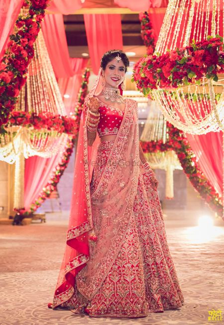 Red embellished bridal lehenga with pink dupatta