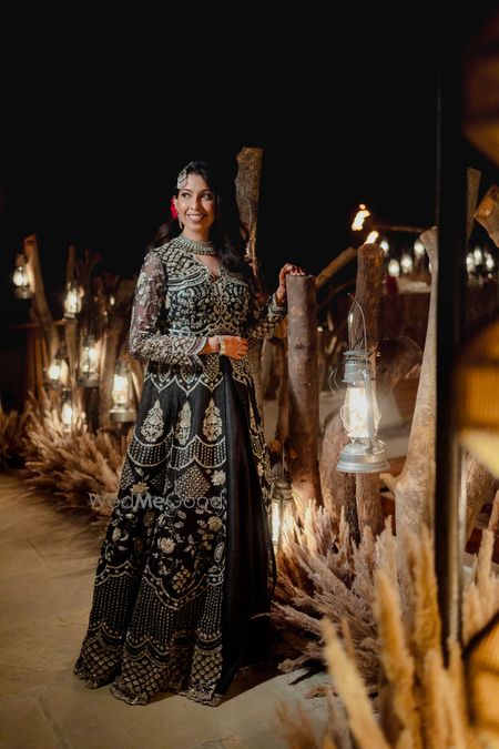 All black and silver anarkali lehenga with a beautiful passa for the bride on her sangeet cocktail night 