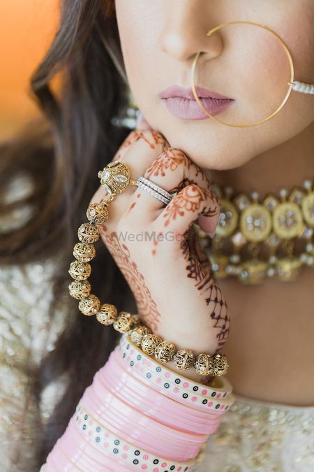 Bridal hands with haathphool and pink Chura 
