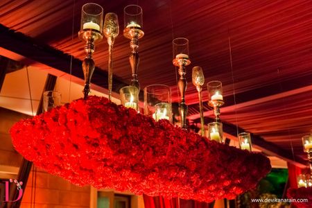 Red roses chandelier with candelabras