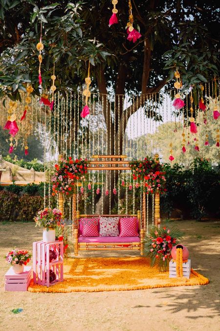 Mehendi swing decor idea with tree hangin