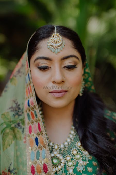 Simple, subtle makeup on the bride. 