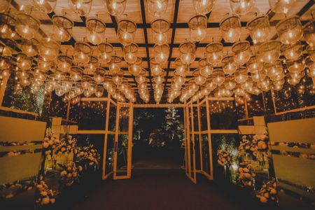 Suspended lights decor at the wedding venue entrance